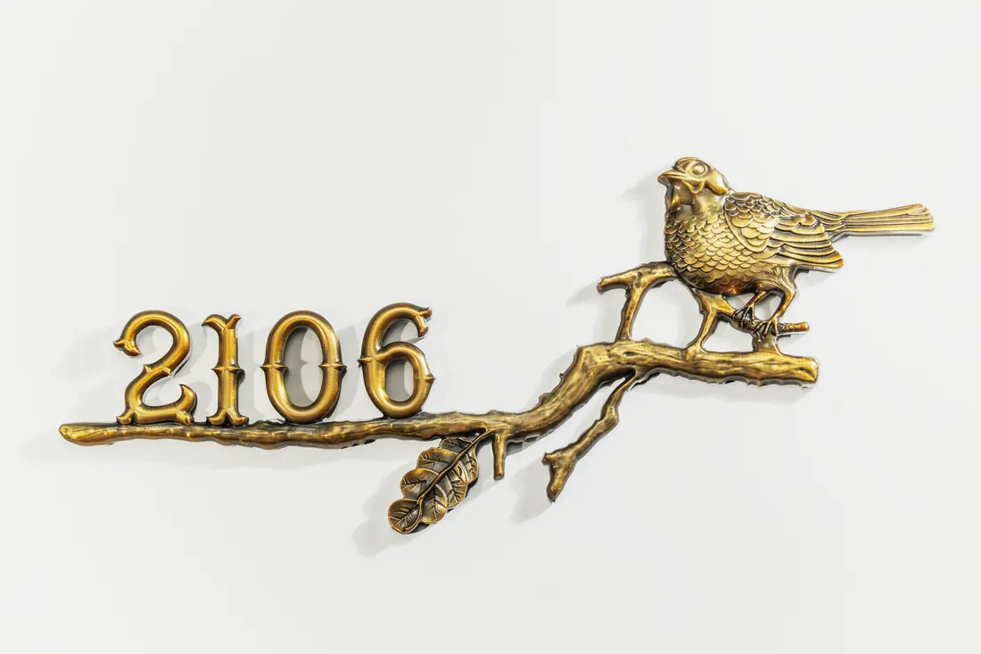 Custom villa address number 2106 with bird and branch decorative relief