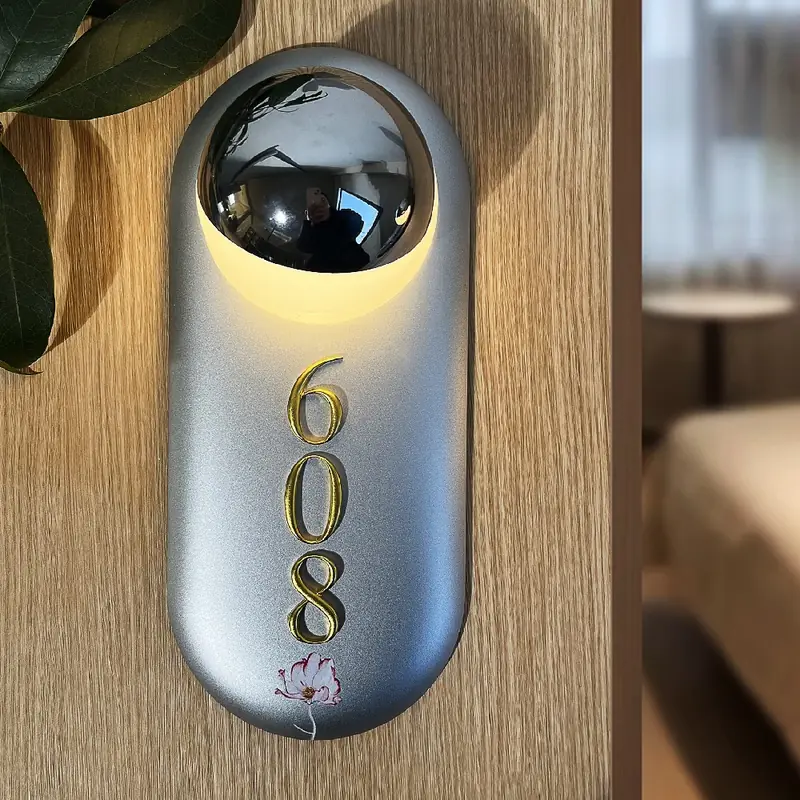 Y001 oval painted aluminum room number 608 with mirror hemisphere